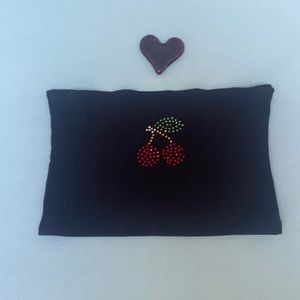 ‘70s here we come. Fun black tube top with cherries